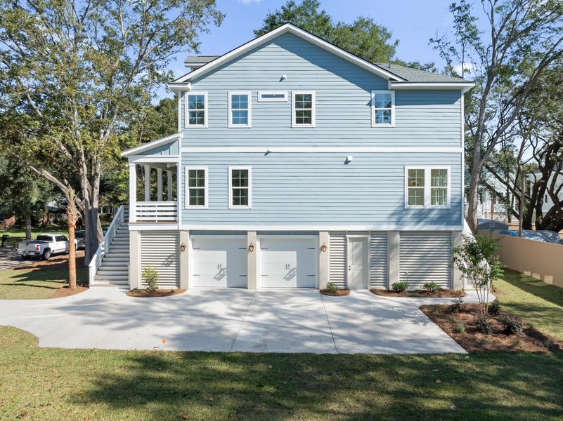 Front exterior of a new home in Ferryboat Landing, Charleston, SC, highlighting curb appeal (Image 2). Front exterior of a new home in Ferryboat Landing, Charleston, SC, highlighting curb appeal (Image 2).