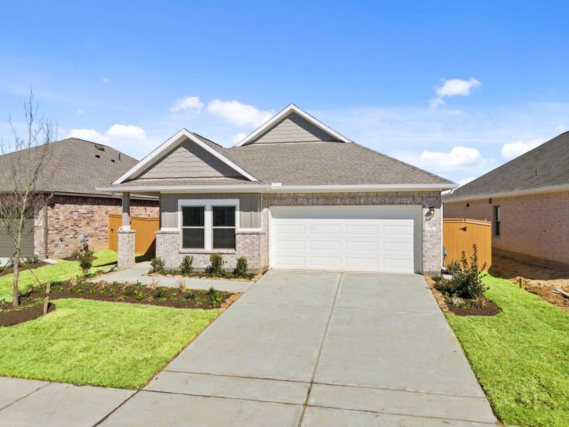 Front exterior of a new home in Cypress Green, Hockley, TX, highlighting curb appeal (Image 23).