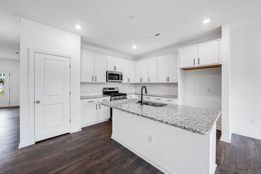 Furnished interior view inside a new home in Magnolia Townes, Wendell (Image 5). Furnished interior view inside a new home in Magnolia Townes, Wendell (Image 5).