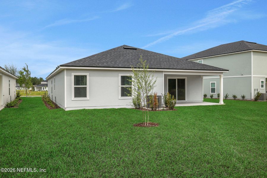 Exterior details and patio area of a home in Amberly, Green Cove Springs (Image 4).