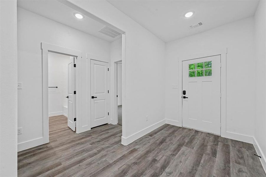 Foyer featuring hardwood / wood-style floors