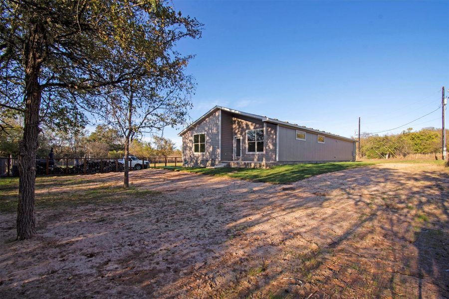 Exterior details and patio area of a home in , Bastrop (Image 4).