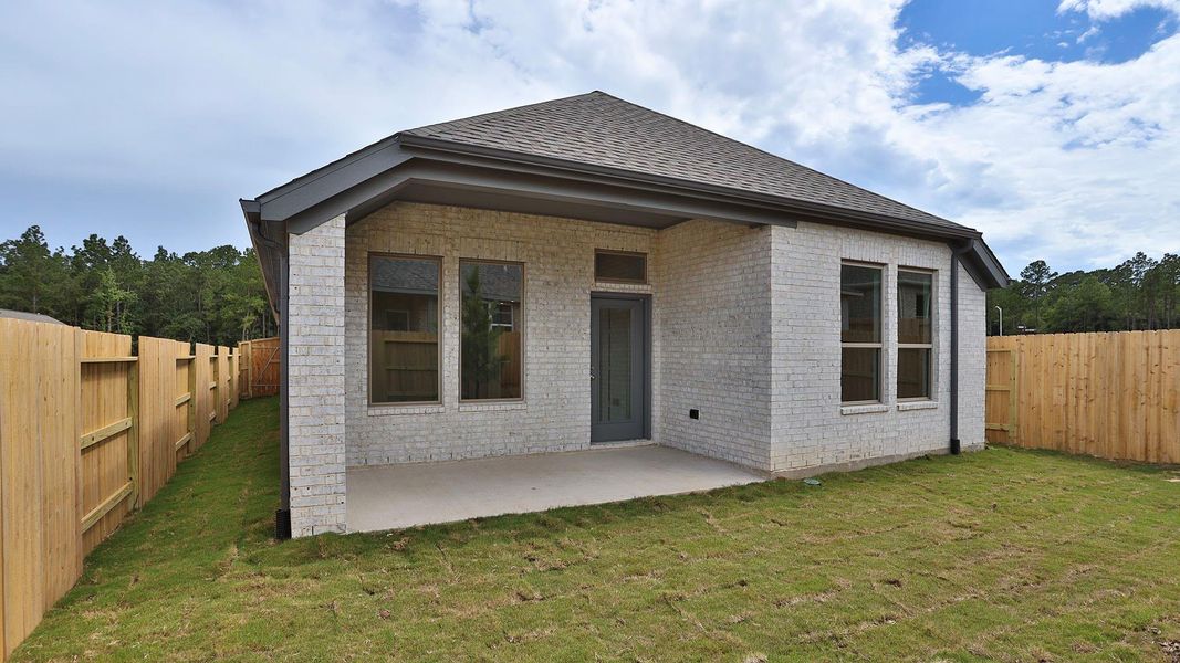 Exterior details and patio area of a home in Wildtree, Magnolia (Image 2).