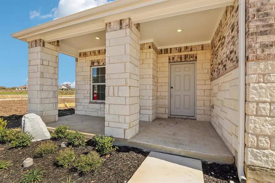 Exterior details and patio area of a home in Hickory Hill, Sherman (Image 3).