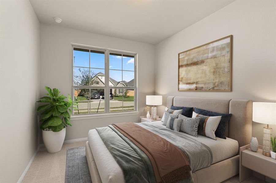 Your secondary bedroom features plush carpet, fresh paint, closet, and a large window that lets in plenty of natural lighting.