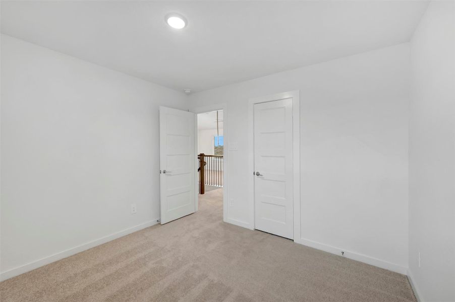 Spacious, unfurnished interior of a new home in Wildrye, Waller (Image 28).
