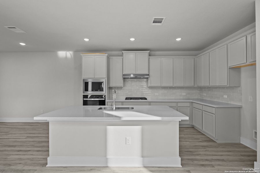 Furnished interior view inside a new home in Veramendi, New Braunfels (Image 9).