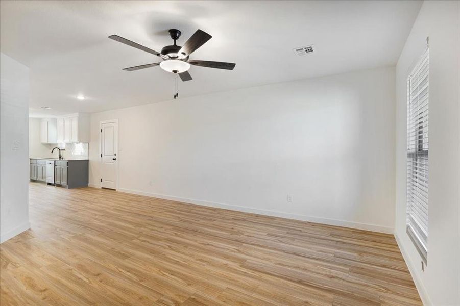 Spacious, unfurnished interior of a new home in Miller Street Cottages, Denison (Image 9).