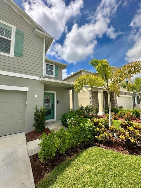 Front exterior of a new home in , Port St. Lucie, FL, highlighting curb appeal (Image 32).