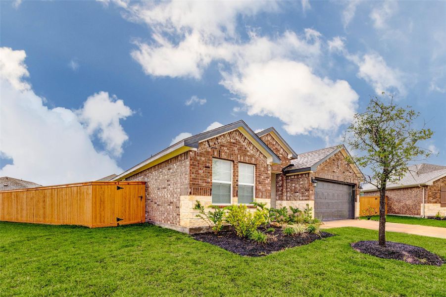Exterior details and patio area of a home in Canterra Creek 45' and 50' Homesites, Iowa Colony (Image 4).