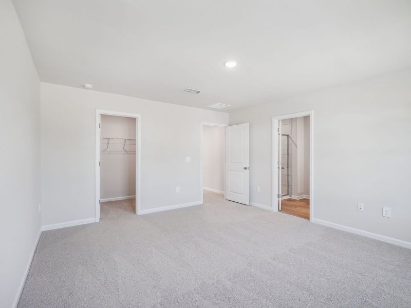 Spacious, unfurnished interior of a new home in The Rows at Buffaloe Reserve, Raleigh (Image 13). Spacious, unfurnished interior of a new home in The Rows at Buffaloe Reserve, Raleigh (Image 13).