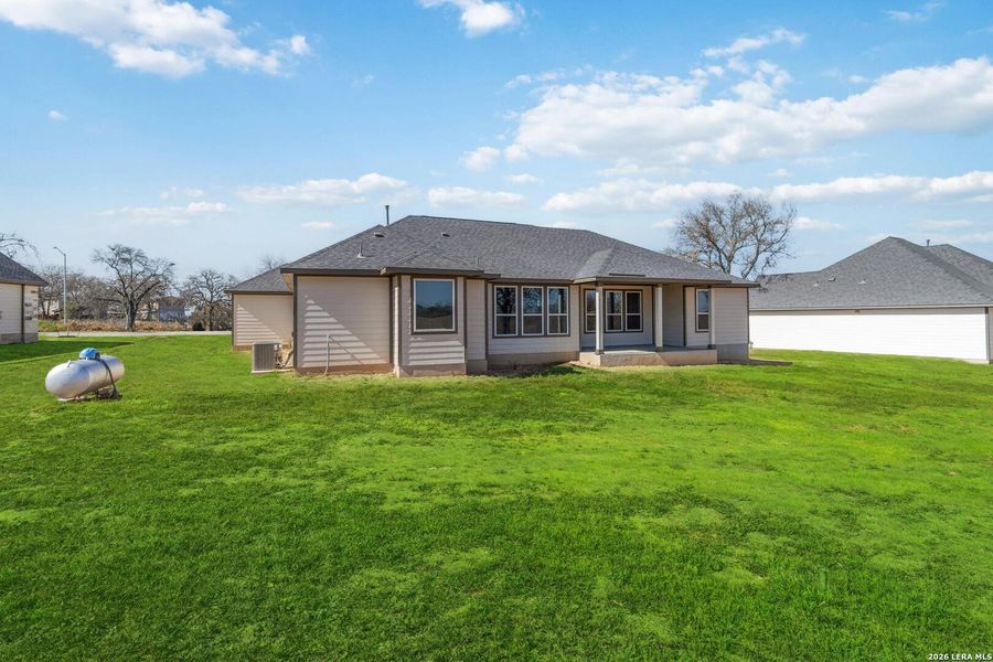 Exterior details and patio area of a home in Lonesome Dove, San Antonio (Image 4).