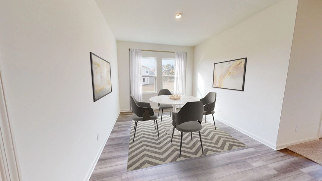 Representative furnished interior of a home built from the Equinox by Starlight Homes in Oakfield Lakes, Parrish (Image 4).