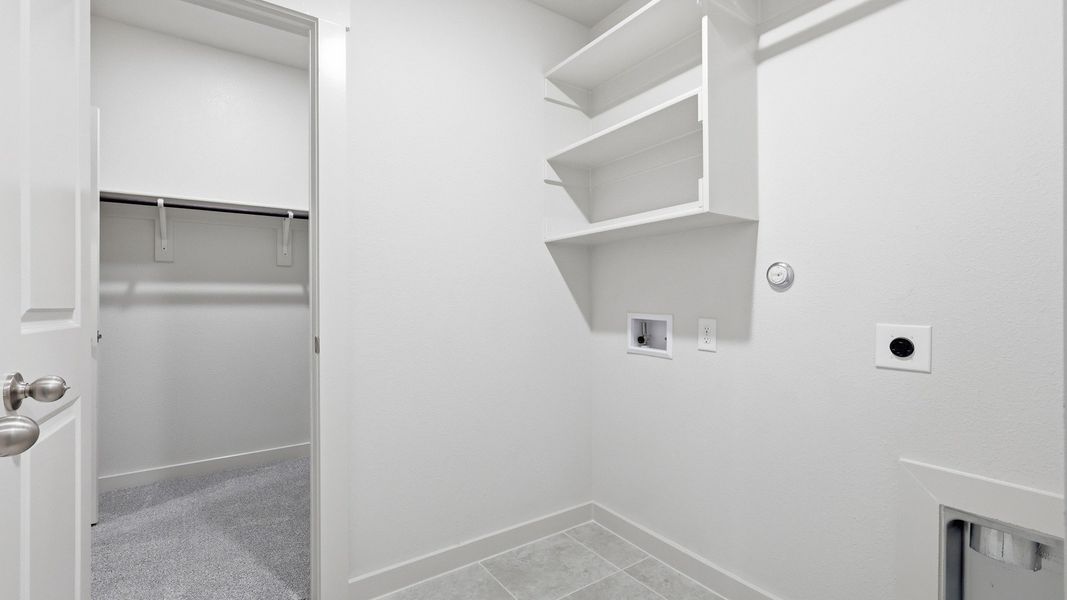 Furnished interior view inside a new home in Patriot Estates, Venus (Image 16).