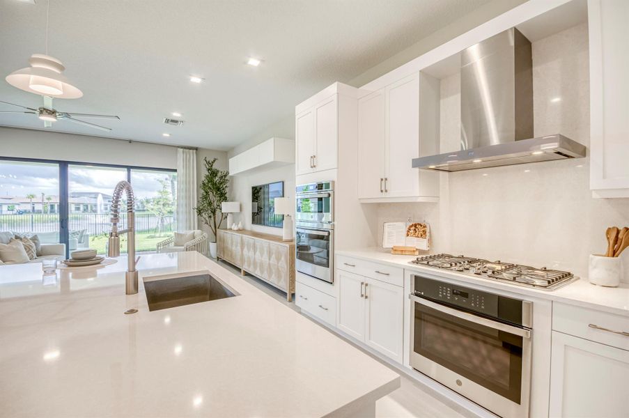 Furnished interior view inside a new home in Apex at Avenir, Palm Beach Gardens (Image 14).