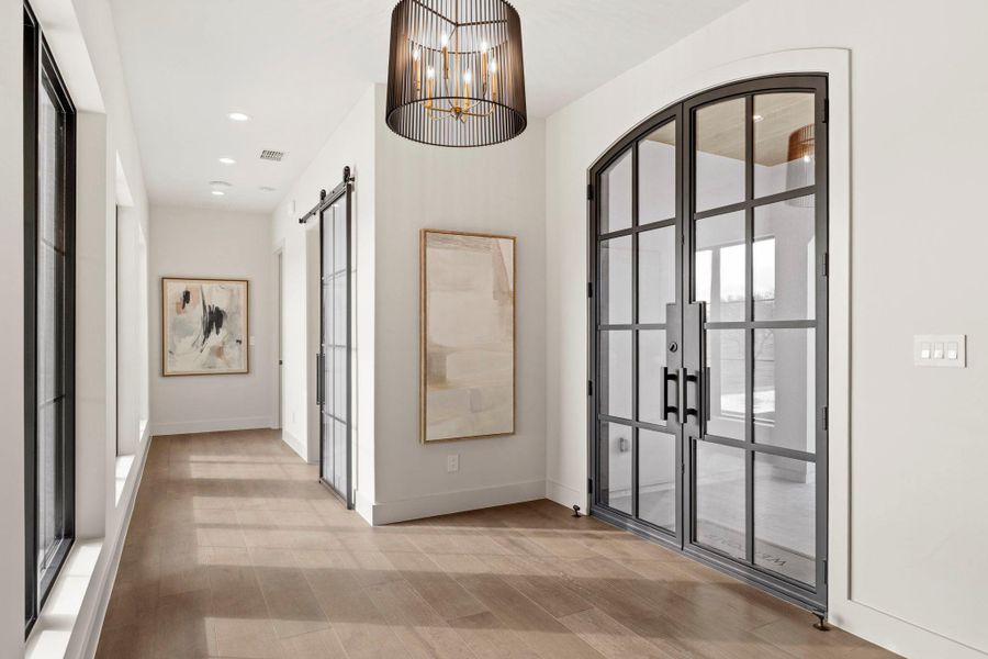 Natural light flows through the welcoming entry way.