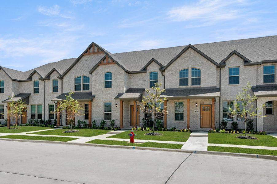 Front exterior of a new home in Sanger Circle – Townhomes, Sanger, TX, highlighting curb appeal (Image 2). Front exterior of a new home in Sanger Circle – Townhomes, Sanger, TX, highlighting curb appeal (Image 2).