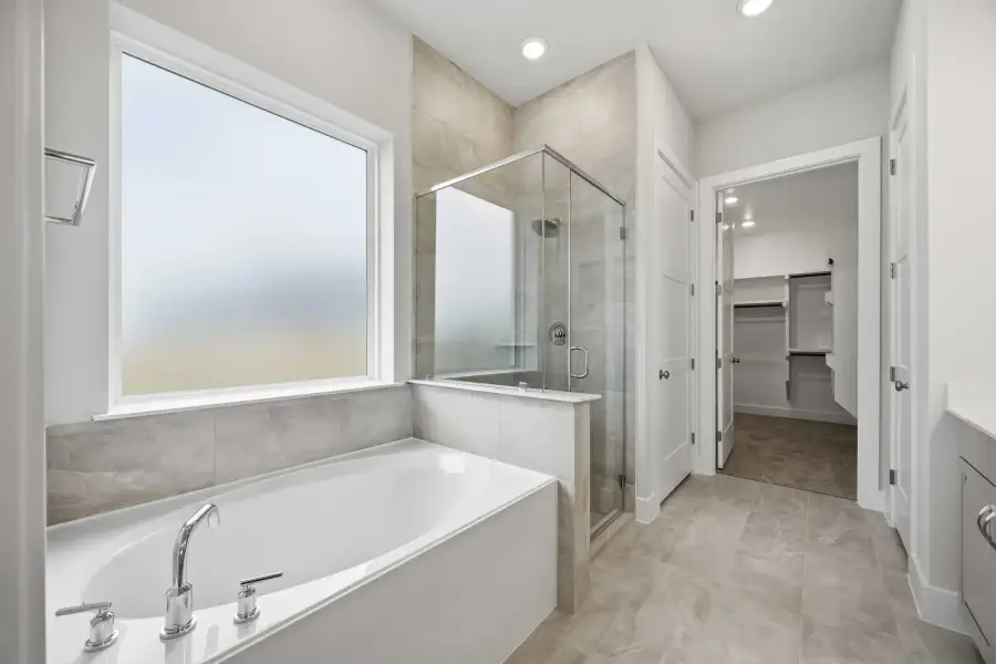 Furnished interior view inside a new home in Ellwood, Iowa Colony (Image 15).