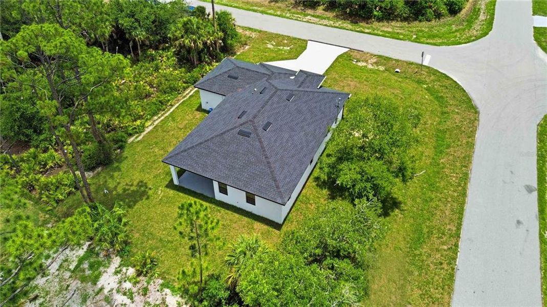 Front exterior of a new home in , Port Charlotte, FL, highlighting curb appeal (Image 22). Front exterior of a new home in , Port Charlotte, FL, highlighting curb appeal (Image 22).