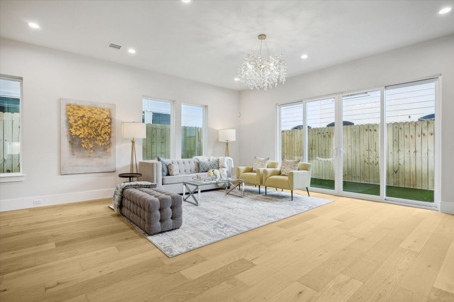 Living room - it has a seamless flow to the outdoor area through the sliding doors. Living room - it has a seamless flow to the outdoor area through the sliding doors.