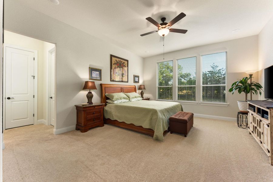 The primary bedroom is huge and overlooks the backyard. It features upgraded Shaw carpet and pad. The primary bedroom is huge and overlooks the backyard. It features upgraded Shaw carpet and pad.