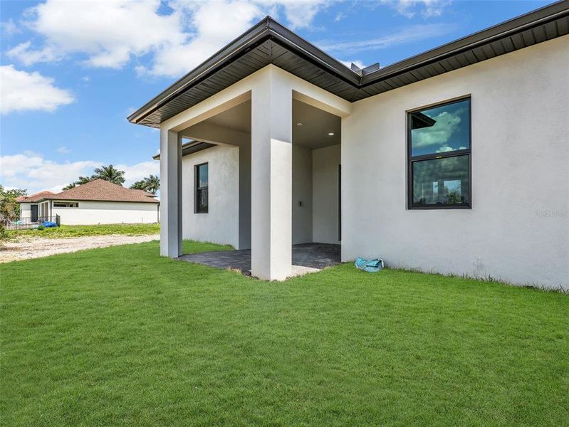 Exterior details and patio area of a home in , Cape Coral (Image 28).