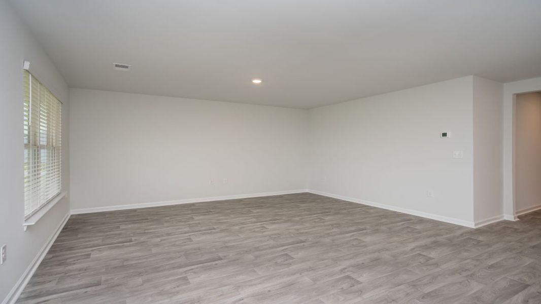 Representative unfurnished interior of a home built from the ARIA by D.R. Horton in The Meadows at Wildwood Village, Shallotte (Image 21). Representative unfurnished interior of a home built from the ARIA by D.R. Horton in The Meadows at Wildwood Village, Shallotte (Image 21).