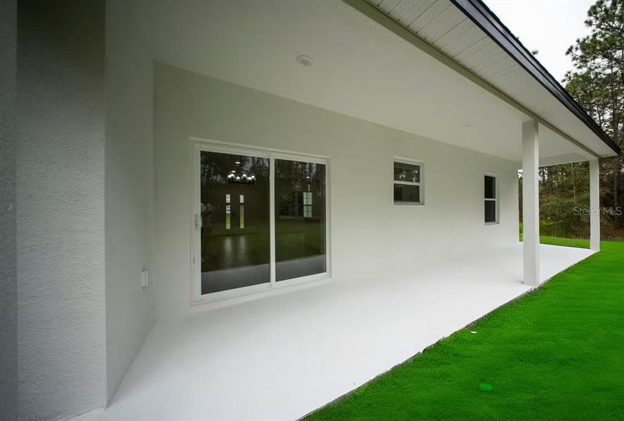 Exterior details and patio area of a home in , Citrus Springs (Image 18).