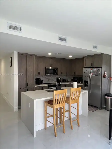 Furnished interior view inside a new home in , Florida City (Image 45).