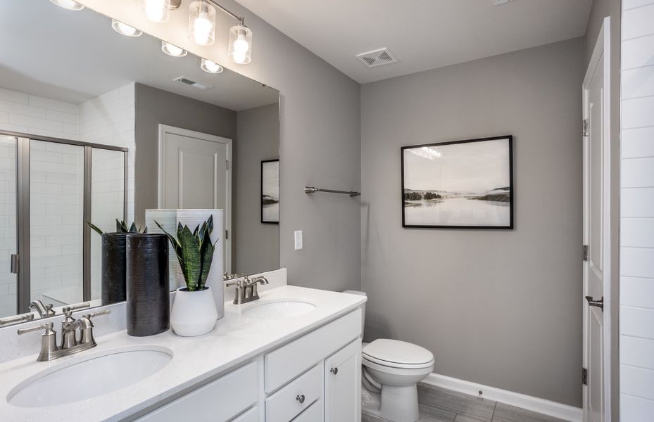 Furnished interior view inside a new home in Exchange at 401, Raleigh (Image 5).