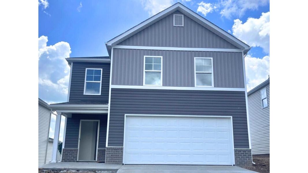 Front exterior of a new home in Johnson Farms, Greeneville, TN, highlighting curb appeal (Image 1).