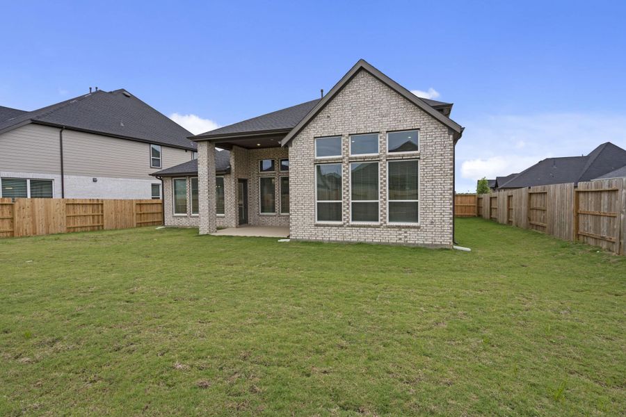 Exterior details and patio area of a home in Attwater 55s, Waller (Image 27).
