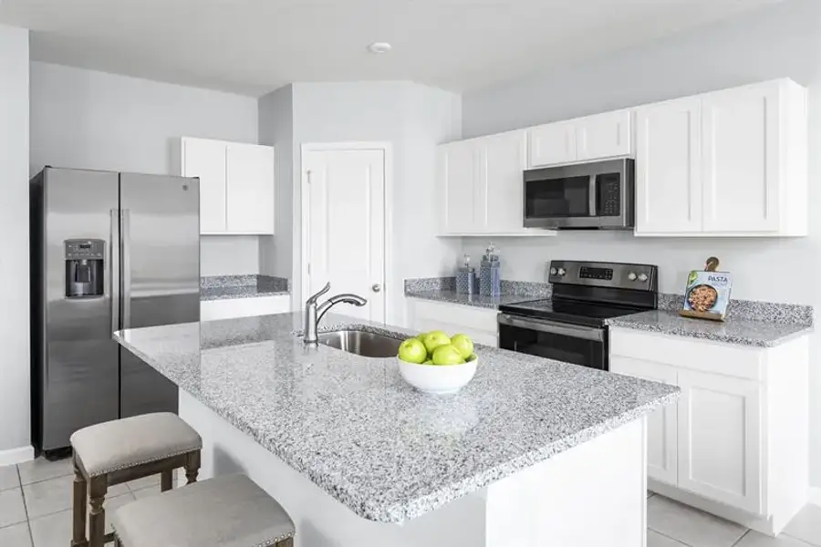 Furnished interior view inside a new home in Central Parc, North Port (Image 3).