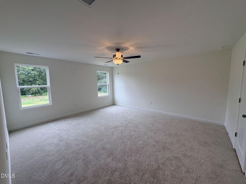 Spacious, unfurnished interior of a new home in Woodland Crossing, Zebulon (Image 20).