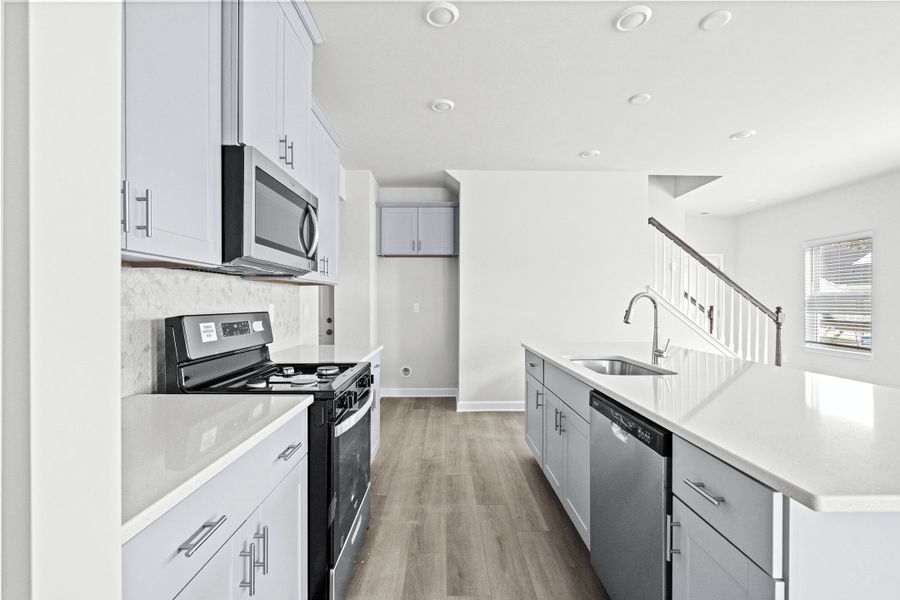 Furnished interior view inside a new home in Waterside - Boardwalk Series, Longs (Image 6).