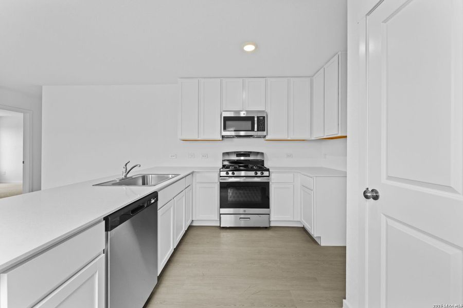 Furnished interior view inside a new home in Spring Grove, St. Hedwig (Image 9).