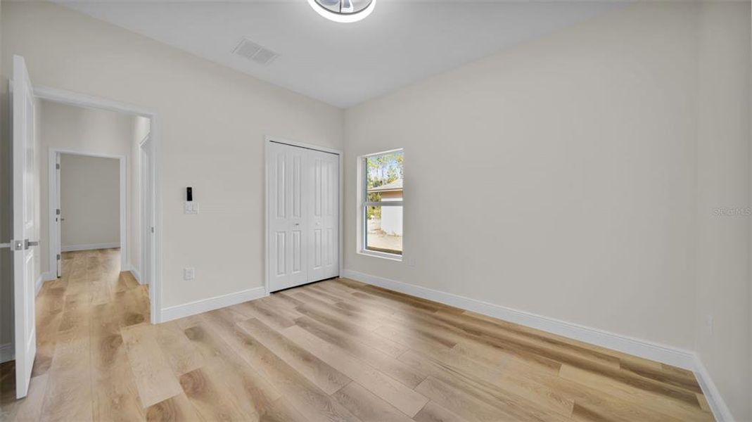 Spacious, unfurnished interior of a new home in , Port Charlotte (Image 33).