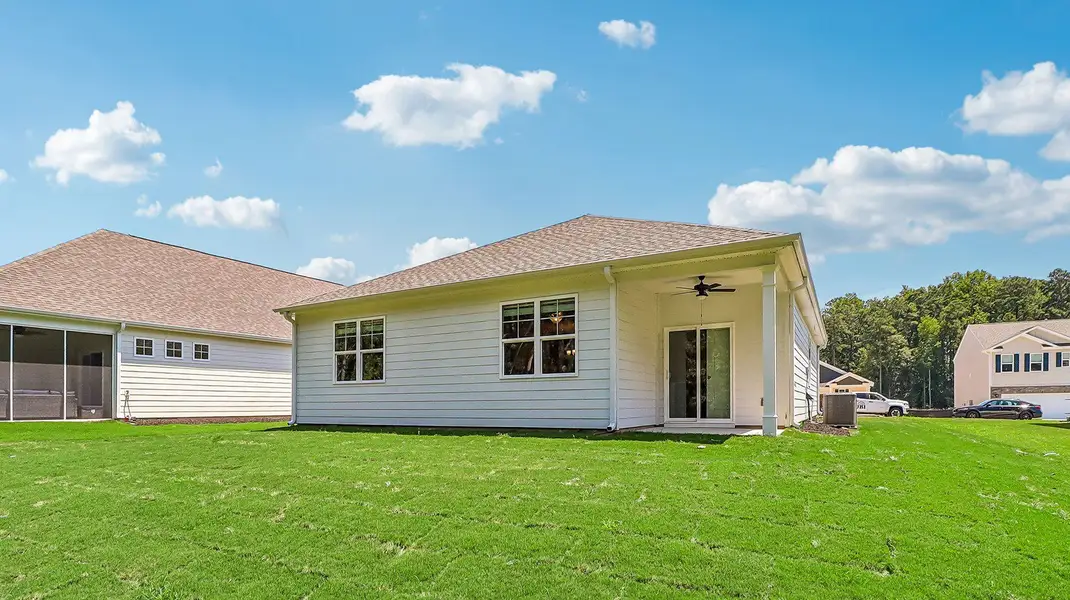 Exterior details and patio area of a home in Sease's Pond, Gilbert (Image 18).