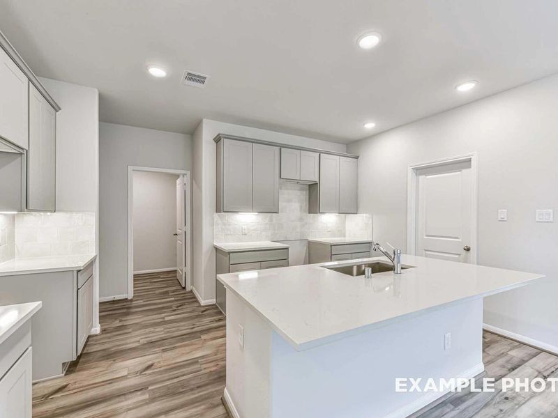 Furnished interior view inside a new home in Sunterra, Katy (Image 10).
