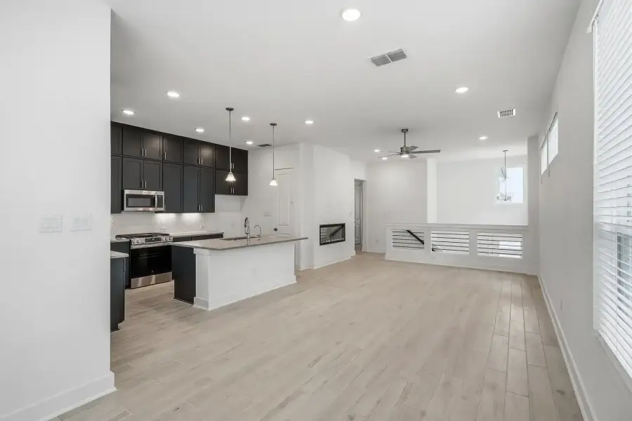 Furnished interior view inside a new home in Rose Hill, San Antonio (Image 6).
