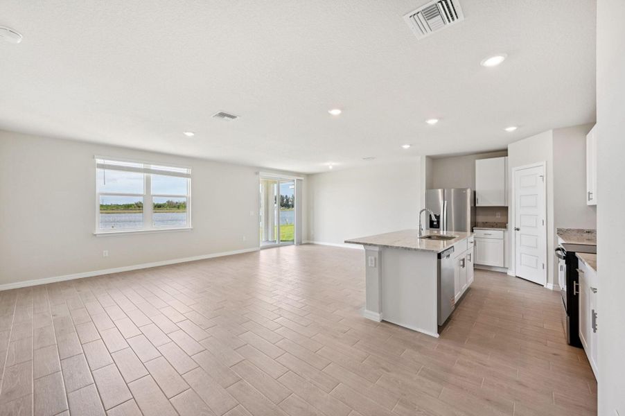 Furnished interior view inside a new home in Hampton Park - Classic Series, Vero Beach (Image 12).