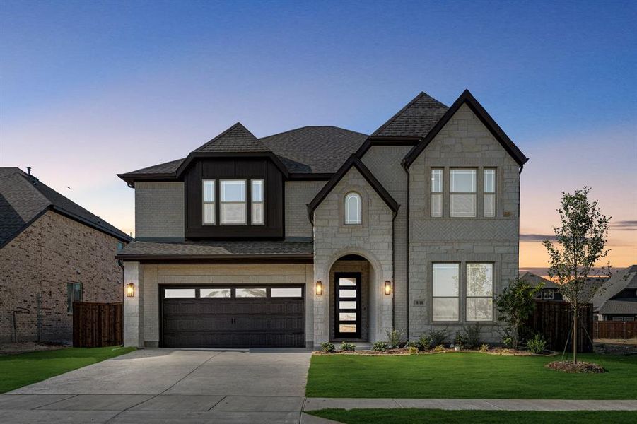 Front exterior of a new home in Wildflower Ranch 60-65, Fort Worth, TX, highlighting curb appeal (Image 26). Front exterior of a new home in Wildflower Ranch 60-65, Fort Worth, TX, highlighting curb appeal (Image 26).