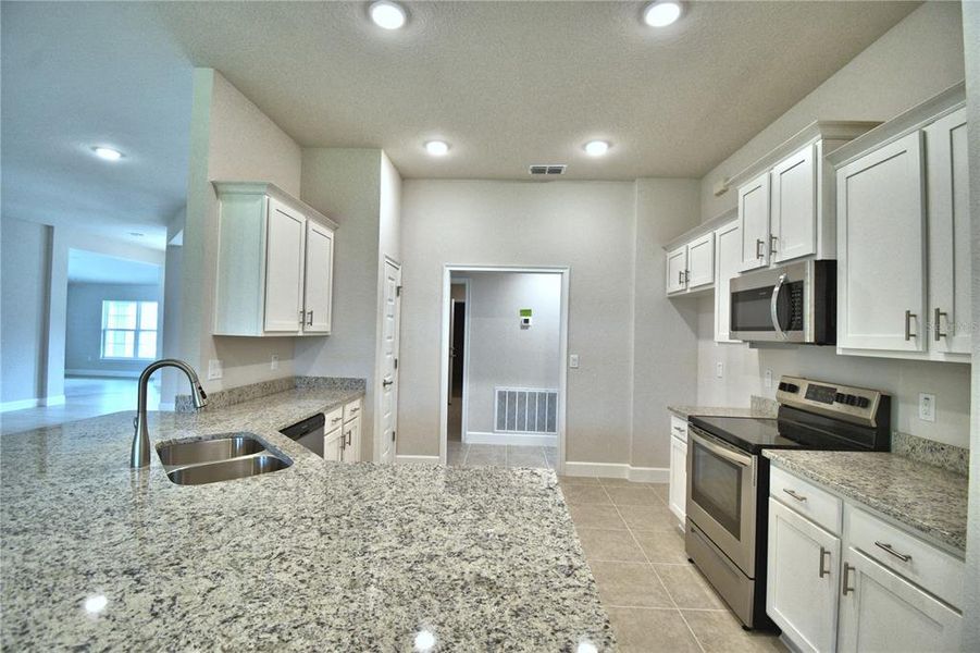 Furnished interior view inside a new home in Cadence Crossing, Auburndale (Image 34).