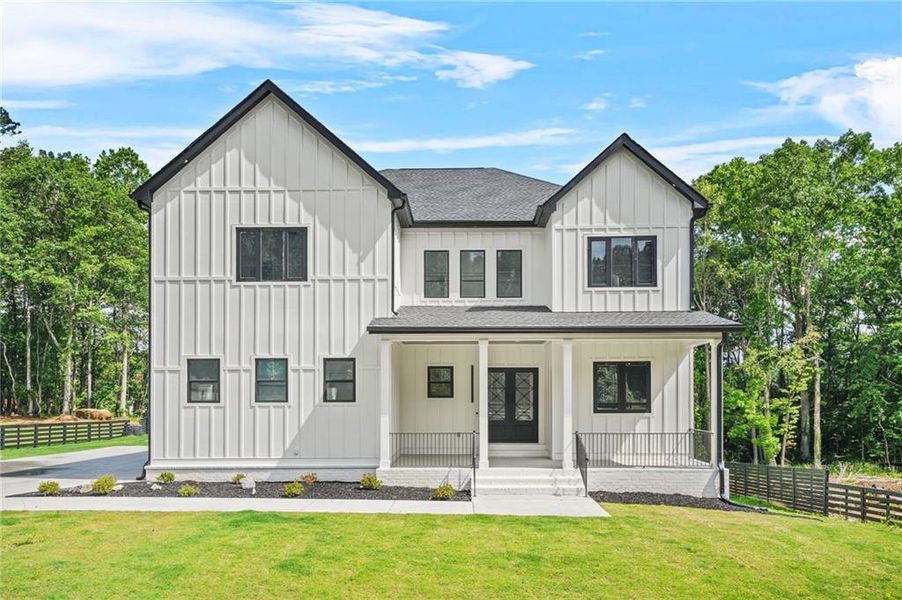 Front exterior of a new home in , Atlanta, GA, highlighting curb appeal (Image 25).