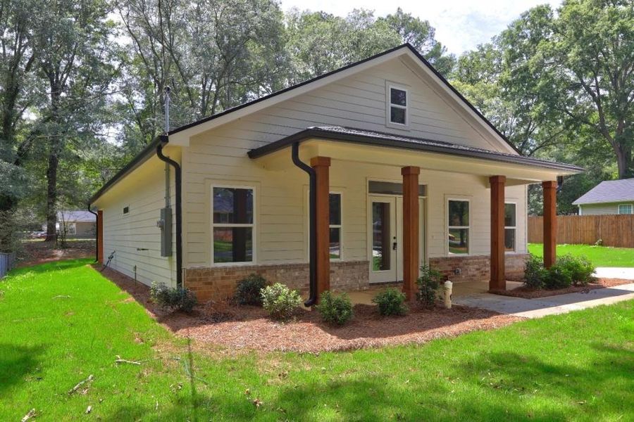 Front exterior of a new home in , Monroe, GA, highlighting curb appeal (Image 19).