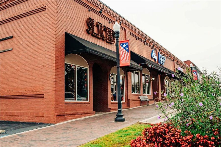 Front exterior of a new home in Rosewood Lake Estates, Hoschton, GA, highlighting curb appeal (Image 54).