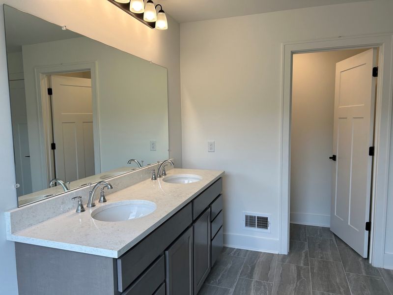 Representative exterior photo of a completed home built from the The Georgetown II Side Entry by Norfolk Homes in Fosdick Glen of Saline, Saline, MI (Image 21).