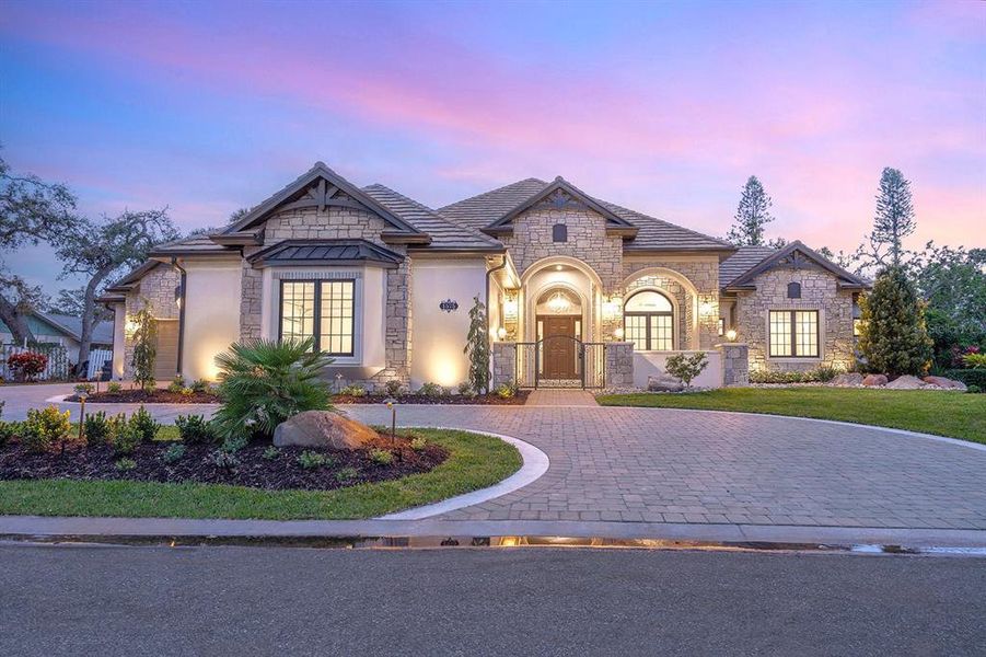 Front exterior of a new home in , Sarasota, FL, highlighting curb appeal (Image 26).