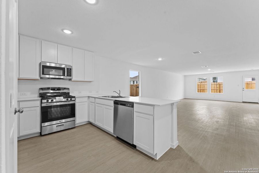 Furnished interior view inside a new home in Voss Farms: Watermill Collection, New Braunfels (Image 6). Furnished interior view inside a new home in Voss Farms: Watermill Collection, New Braunfels (Image 6).