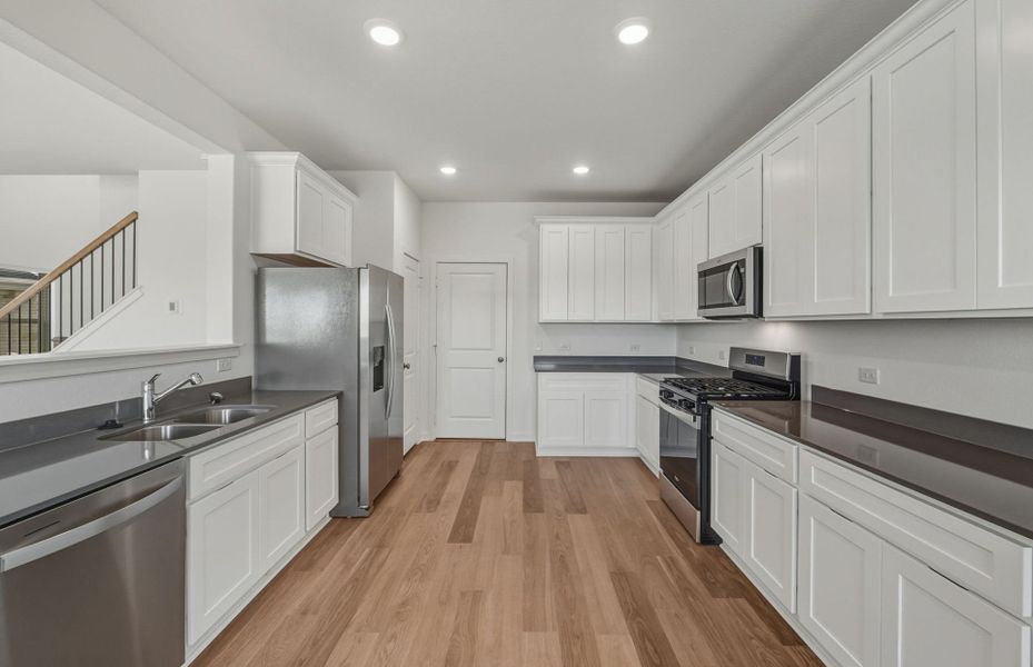 Furnished interior view inside a new home in Sunfield, Buda (Image 7).